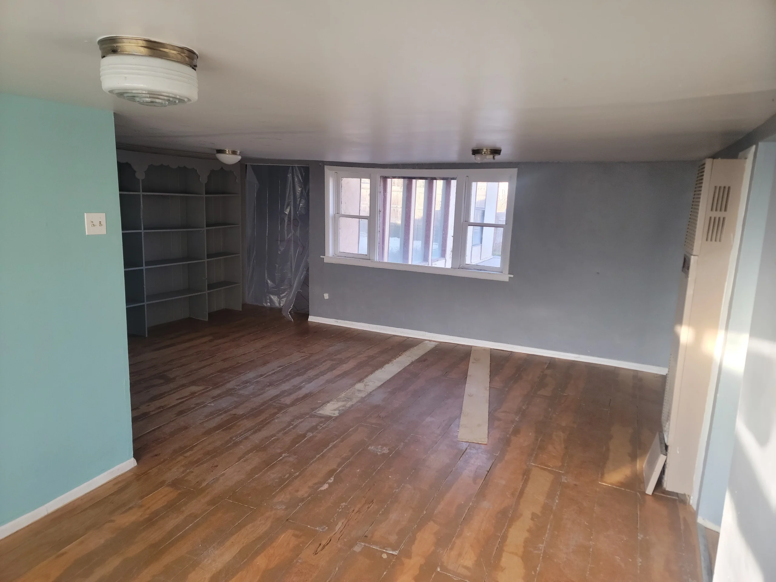 Demolition phase showing exposed framing